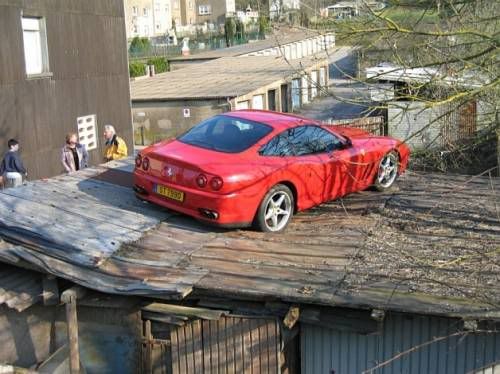 car parked on a roof photo: Female car parking womanparking.jpg