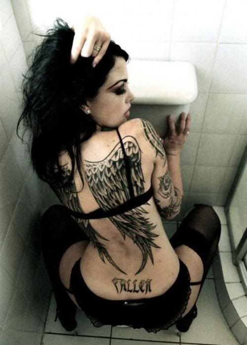 Tattooed Women – Classy Yet Sexy Tattoos For Women dolphins-tattoo – Women